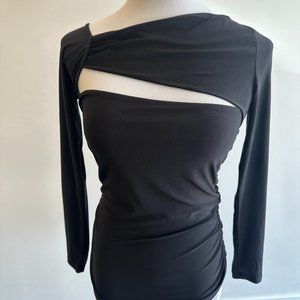 Black, stretchy, long sleeved top with, cut outs in the front and back.